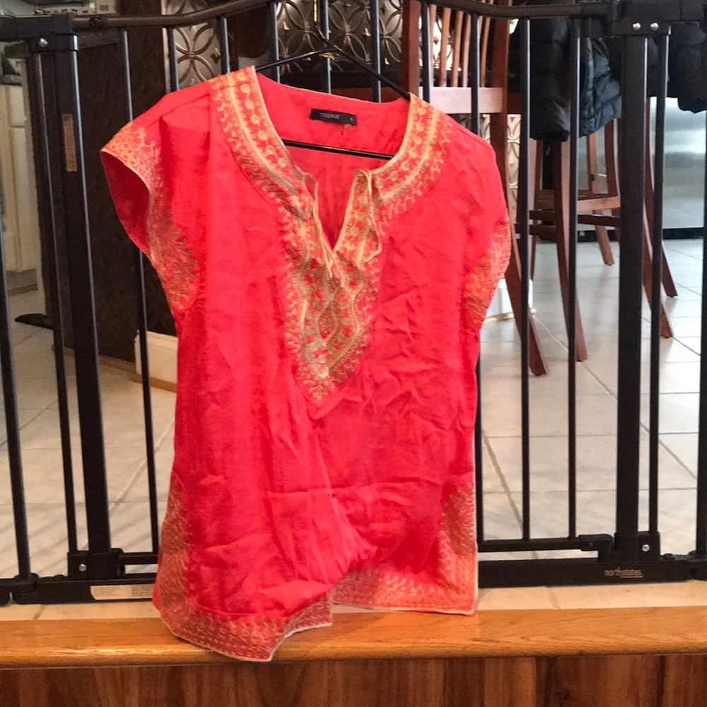 Blouse with gold patterned stitching